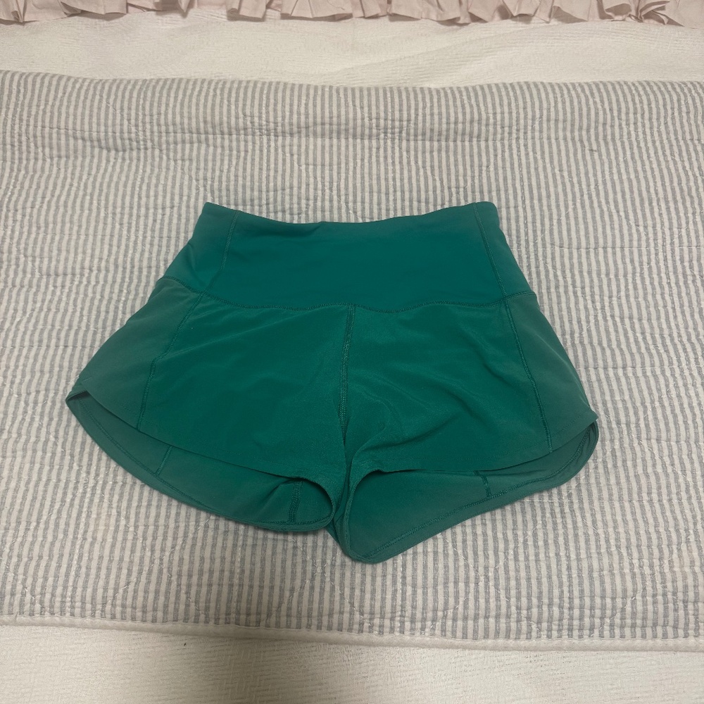 green high waisted lululemon speed up 2.5 inch shorts